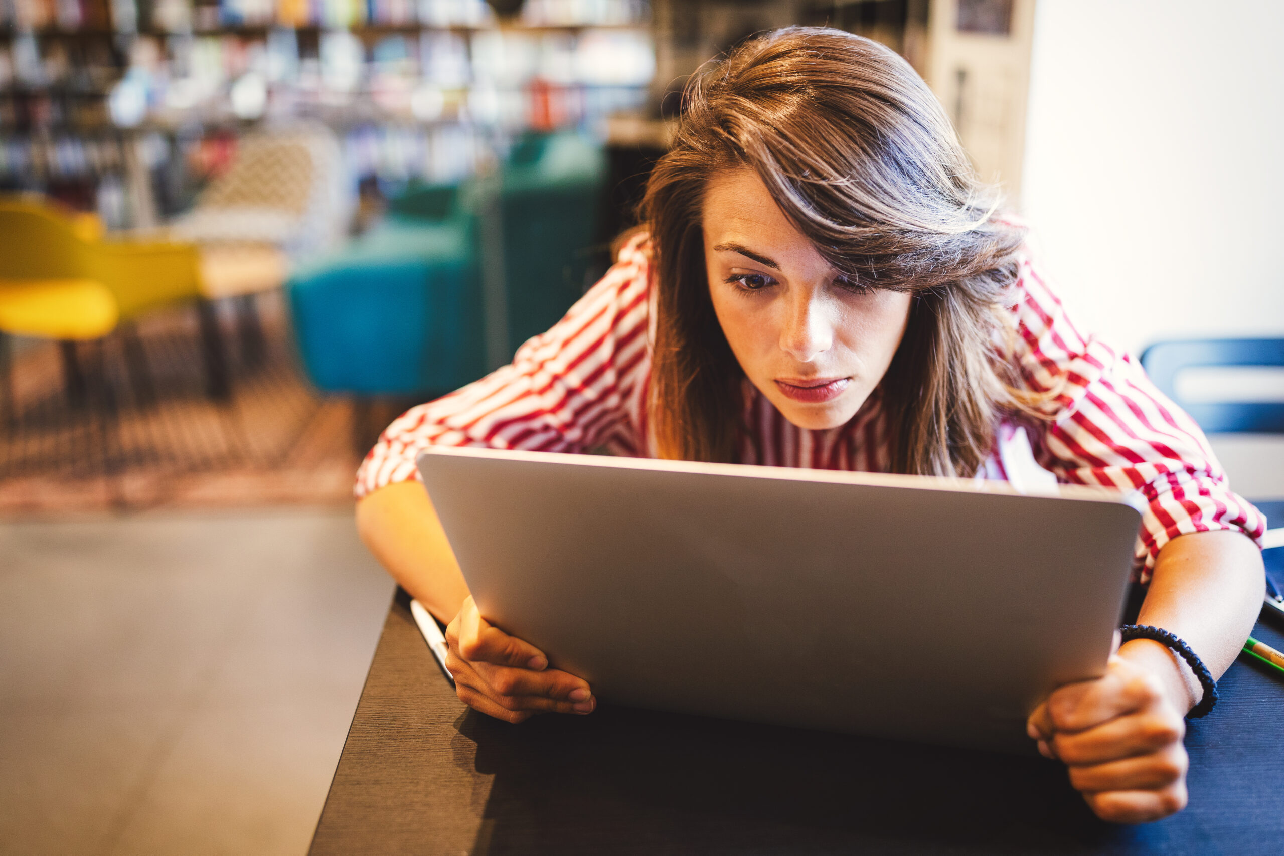 Student woman finding it difficult at study and comprehend scool tasks